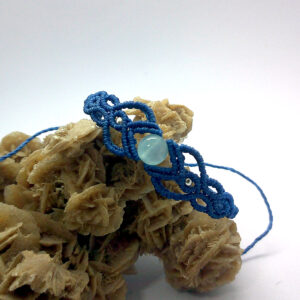 Bracciale in macramè con perla centrale