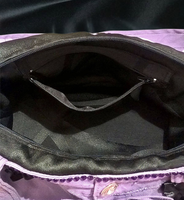 borsa-di-jeans viola tasca cerniera aperta